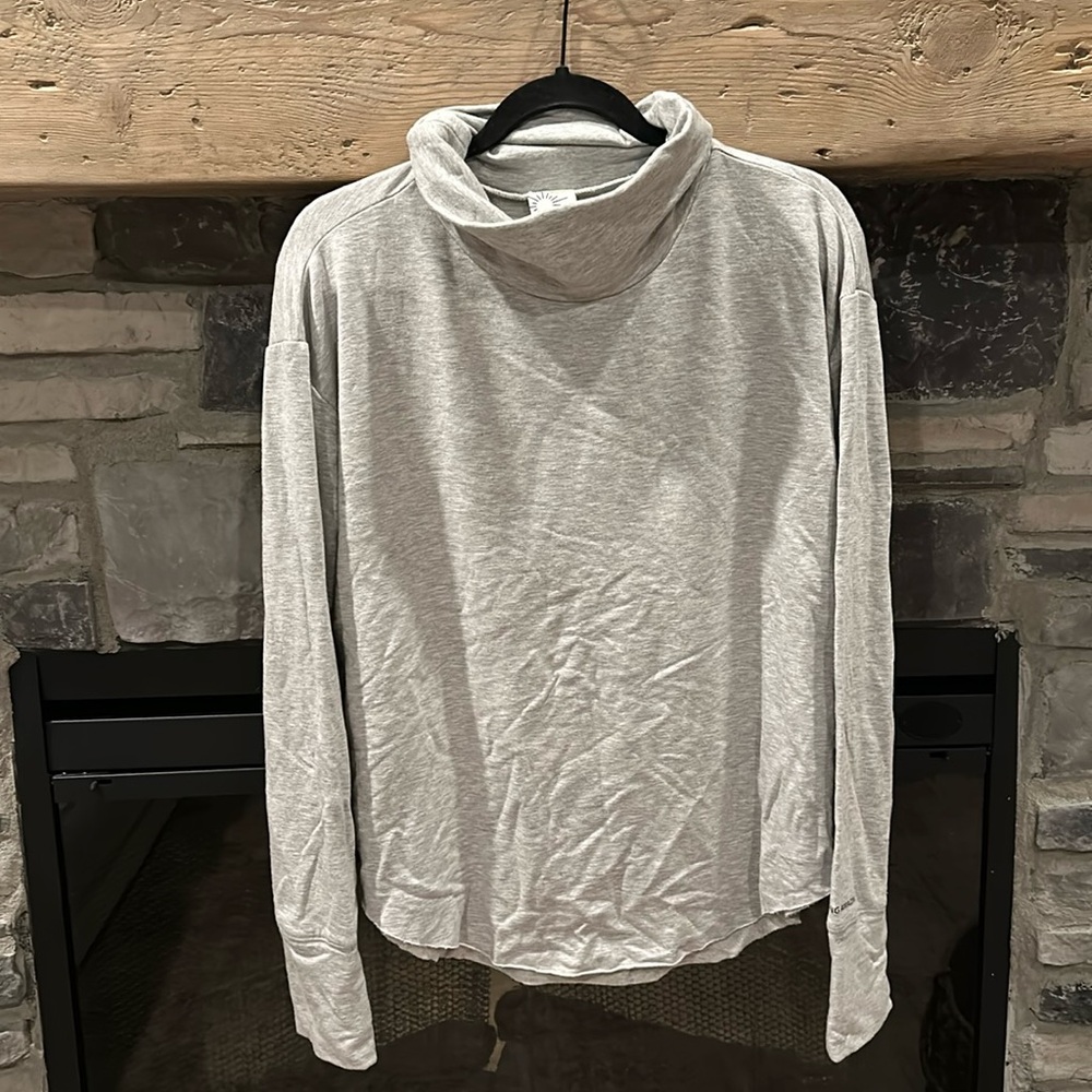 Like new, hardly worn! Gray jersey material long sleeve sweatshirt.